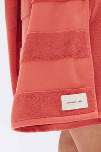 Assembly Label | Jacquard Tile Beach Towel - Papaya