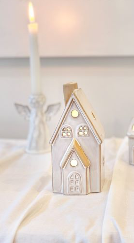 Lucia Snow House with Lights