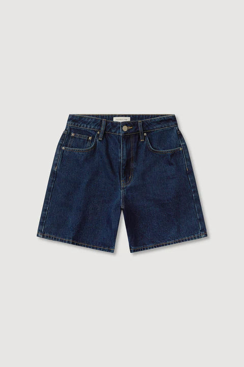 Blue denim shorts on a light gray background