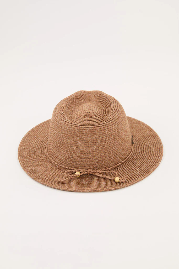 Brown straw hat with a tonal plaited hatband on a light beige background