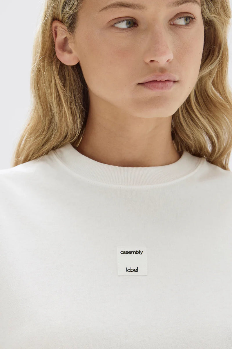Assembly Label | White Exhibit Patch Short-Sleeve Tee