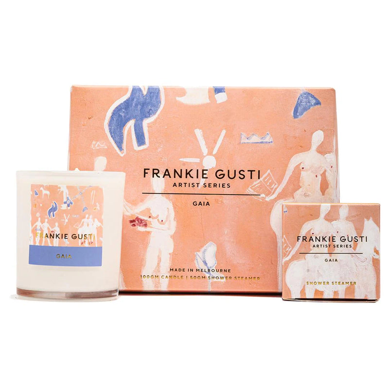 A product image featuring a candle and its packaging with artistic illustrations. The candle is labeled 'Frankie Gusti' and has a wooden lid.