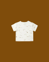 White t-shirt with subtle pattern on a white background