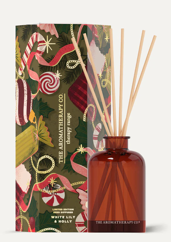 Aromatherapy diffuser with decorative packaging featuring Christmas-themed design.