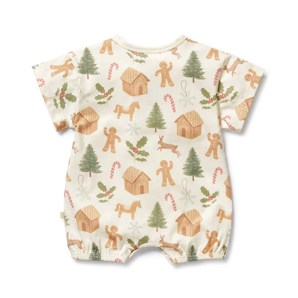 Baby romper with Christmas-themed pattern on a white background