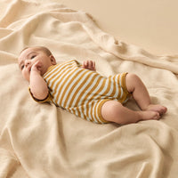 Wilson + Frenchy | Golden Wave Stripe Organic Knitted Growsuit