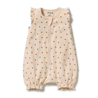 BEIGE ONESIE FEATURING ORANGE LADYBUGS AND A RUFFLE DETAIL ON THE SHOULDERS AND LEG