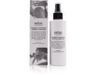 A bottle of Salus Rosemary & Eucalyptus Botanical Room Spray with its packaging box. The bottle is white with a spray nozzle, and the box has similar design elements.